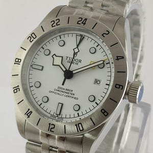 Montre automatique vintage Tudor : montre-bracelet pour homme en acier inoxydable à cadran blanc révisée