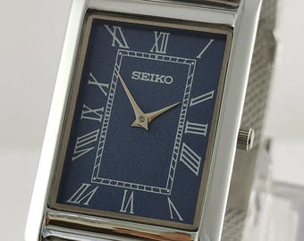 Orologio da uomo al quarzo Seiko Slim Tank, classico e vintage, con quadrante blu e indici romani