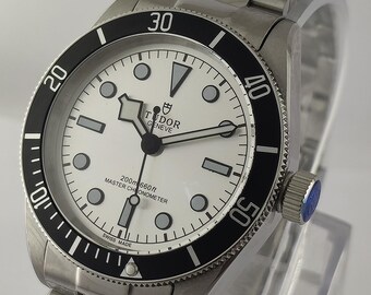Vintage Tudor Automatic Watch: Silver Dial Stainless Steel Men's Wristwatch Serviced
