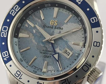 Reloj automático vintage Grand Seiko GMT: esfera azul cielo, acero inoxidable, funciona perfectamente.