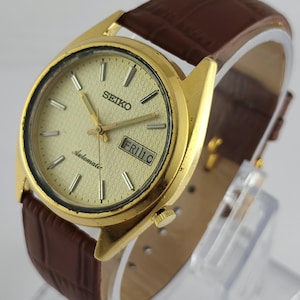 Vintage Seiko 5 Automatic Watch: Gold Plated Case, Yellow Dial