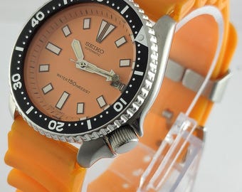 Vintage Seiko Diver Automatic Rotating Bezel Cal.7002 Orange Dial With Date Men's Wristwatch 1980's
