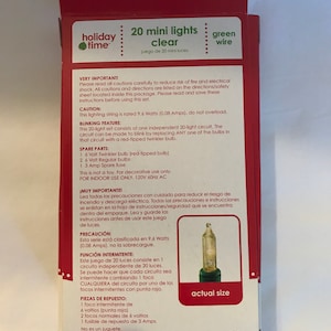 May include: A package of 20 clear mini lights with green wire. The lights are rated at 9.6 watts and are for indoor use only. The package includes a spare bulb and fuse. The package also includes instructions for use and safety precautions.