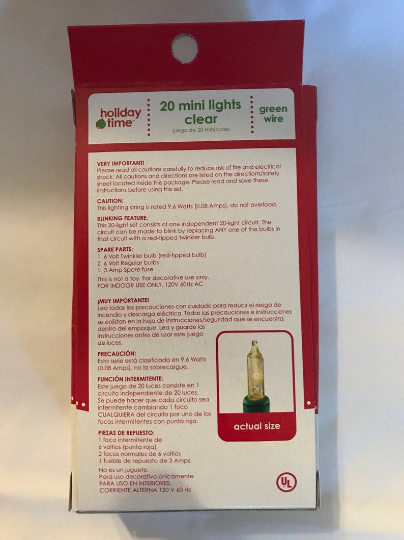 May include: A package of 20 clear mini lights with green wire. The lights are rated at 9.6 watts and are for indoor use only. The package includes a spare bulb and fuse. The package also includes instructions for use and safety precautions.