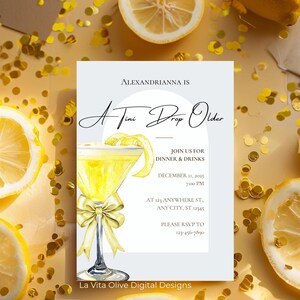 May include: A cocktail-themed invitation with the text "Alexandrianna is A Tini Drop Older." The invitation features a watercolor illustration of a martini glass with a lemon twist and a bow. The background is yellow with lemon slices and confetti.