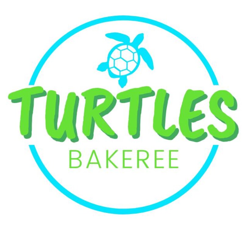 May include: A logo featuring the word "TURTLES" in bright green, outlined in white, above the word "BAKEREE" in a smaller, light green font. A blue turtle icon and a blue circle frame the text.