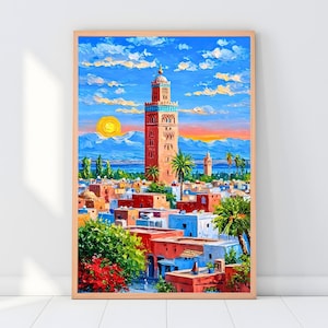 May include: A framed painting depicts a vibrant cityscape with a tall, red-brick minaret dominating the scene. The artwork showcases colorful buildings, palm trees, and a sunset with a bright sun and fluffy clouds. The style is impressionistic.