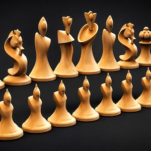 May include: A set of light-colored wooden chess pieces featuring abstract, smooth, and curved designs. The collection includes a variety of tall, sculpted figures with rounded bases, including knights with curved necks and pieces with lotus-like tops.