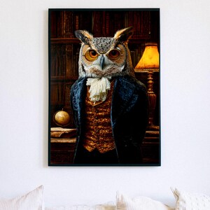 May include: Framed artwork featuring an owl dressed in formal attire, including a dark blue coat and a ruffled white cravat. The owl has orange eyes and is set against a backdrop of a library with a globe and a lit lamp.