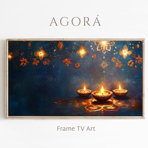 Op de afbeelding: Een ingelijste digitale kunstprint met een donkerblauwe achtergrond, versierd met gloeiende oranje en gouden bloemen en stervormige patronen. Drie brandende kaarsen op de voorgrond. De teksten "AGORÁ" en "Frame TV Art" zijn zichtbaar.