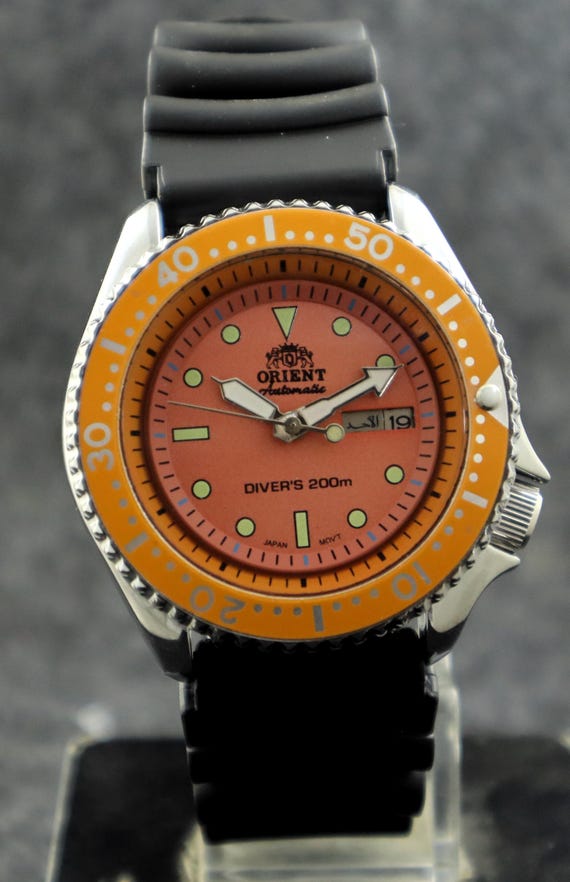 Beautiful Orient Automatic Orange Dial Rotating Bezel Date/day