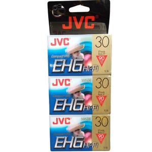 May include: Three JVC Compact VHS EHG Hi-Fi video cassettes. Each cassette is labeled with "30" and "90 min". The packaging features the JVC logo and a graphic of a person.