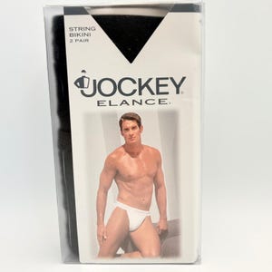 May include: A set of three ceramic mugs with a speckled, matte finish. The mugs are in shades of cream, light gray, and dark gray. Each mug has a simple, minimalist design, perfect for coffee or tea.