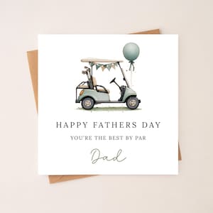 May include: A Father's Day card with a watercolour illustration of a golf cart and a balloon. The card reads "Happy Fathers Day, You're the Best By Par, Dad". The card is on a white background, with a brown envelope.