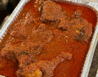 Nigerian Stew  served with Chicken,Beef,goat, fish or assorted meat. Meat options can be mixed