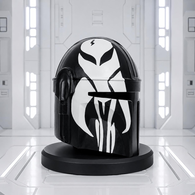 May include: A black helmet with a white graphic design, including a lightning bolt and stylized avian features. The helmet is displayed on a black circular stand, set against a futuristic white backdrop.