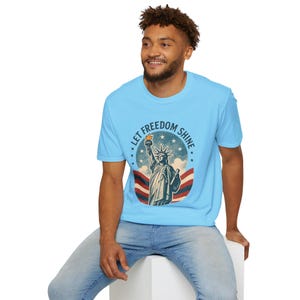 Let Freedom Shine Graphic T-Shirt – Patriotic Liberty Print, 4th of July Gift, Unisex USA Apparel