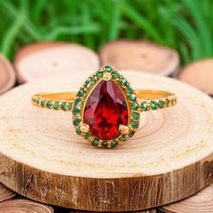 Pear Cut Red Garnet Ring: Sterling Silver & CZ Accents