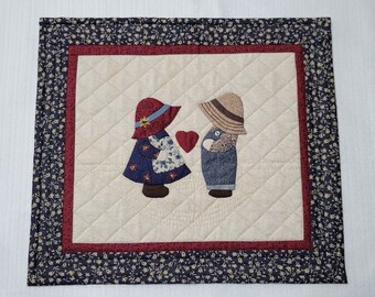 Sunbonnet Sue & Overalls Sam in love! This sweet table mat or wallhanging brings warmth to any home. Traditional hand applique. Approx 15x13
