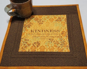 KINDNESS is a FRUIT of the SPIRIT and this 13x13 snack mat or mug rug be a gentle daily reminder! Handmade of cotton & washable. Brown Gold