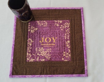 JOY is a FRUIT of the SPIRIT and this 13x13 snack mat or mug rug be a gentle daily reminder! Handmade of cotton very washable. Purple Brown