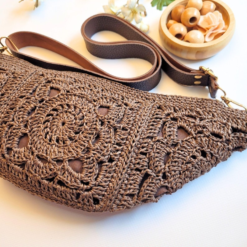Minimalist flat lay featuring crochet pattern download, yarn, and tools – a digital DIY crochet bag pattern.