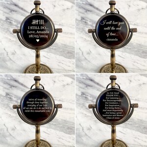 May include: A vintage-style brass pocket watch on a stand. The watch face has a dark background with white text that reads "I STILL DO... Love, Amanda 28/05/2024". The watch is supported by a decorative brass stand.