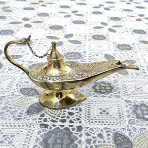 Brass replica of Aladdin&#39;s Magic Lamp, also known as a Genie Chirag