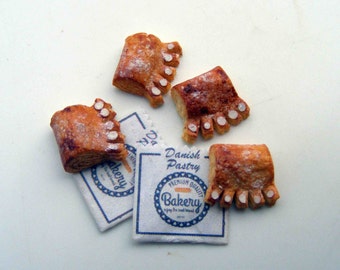 Bear claws with paper bags