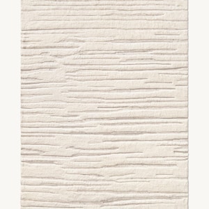 May include: Cream-colored rectangular rug with a textured, horizontal stripe pattern. The rug's design features varying widths and depths, creating a tactile surface. The neutral color palette makes it suitable for various interior styles.