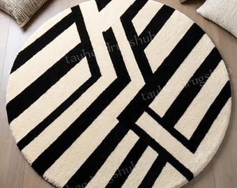 Modern rond vloerkleed – zwart en ivoor geometrisch, handgetuft wollen tapijt