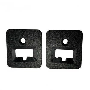 May include: Two black, textured, square-shaped plastic parts. Each part has a rectangular opening at the bottom and a circular hole at the top. The parts are designed for a specific function.