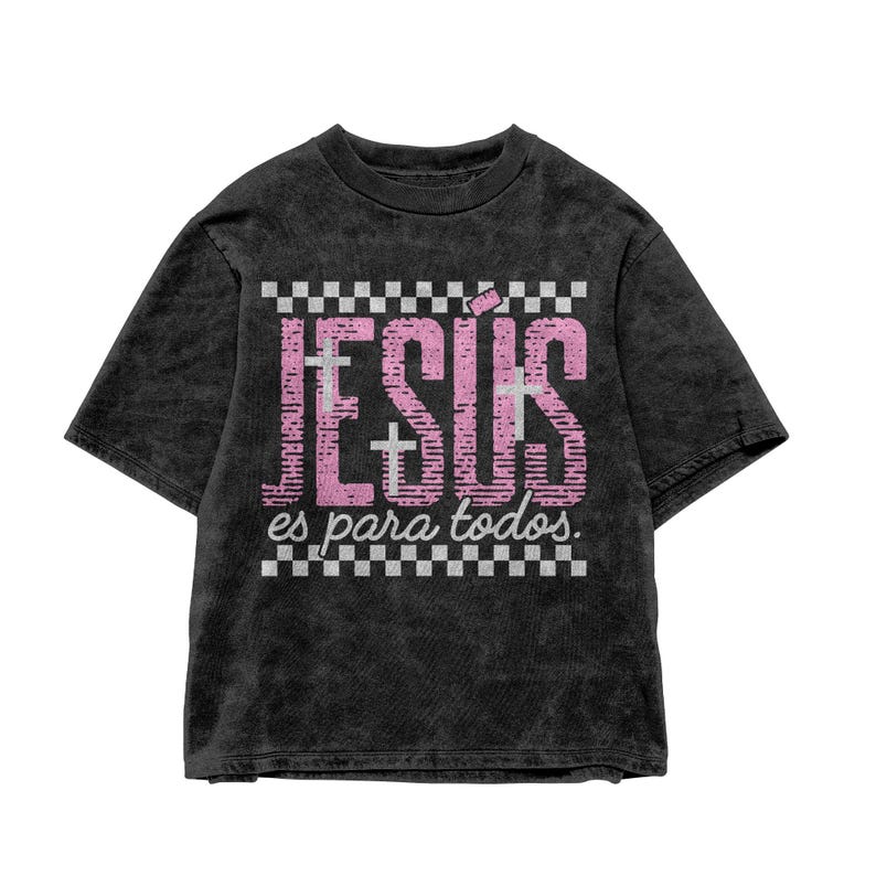Vintage washed black t-shirt mockup displaying distressed pink “JESÚS” lettering layered with white cross graphics and checkerboard accents above and below the phrase “es para todos.” The textured fabric enhances the bold contrast, creating a trendy Spanish Christian streetwear design perfect for church gatherings and faith-based outfits.