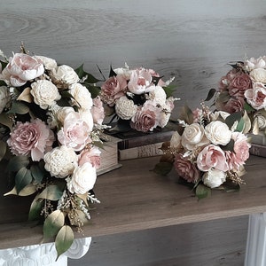 Cottage Rose Collection in Light Dusty Rose, Ivory, and Metallic Gold accents. Made with artificial Greenery and Soft Sola Wood Flowers