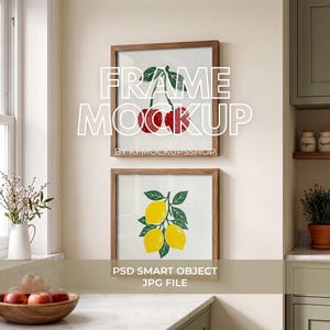 May include: Two square wooden frames hanging on a wall, one displaying a red cherry illustration and the other a yellow lemon illustration. The text FRAME MOCKUP BY KF MOCKUPSSHOP and PSD SMART OBJECT JPG FILE is overlaid on the image.