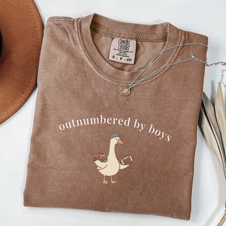 Outnumbered By Boys Shirt, Funny Boy Mom Tee, Goose with Truck and Football Graphic, Motherhood Humor Gift, Mom Life
Outnumbered by boys