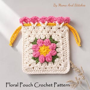 May include: A cream-coloured crocheted floral pouch pattern with pink, yellow, and green details. The square pouch has a large pink flower with a yellow centre. The top edge is scalloped pink, with yellow drawstring cords. The text "Floral Pouch Crochet Pattern" is at the bottom.