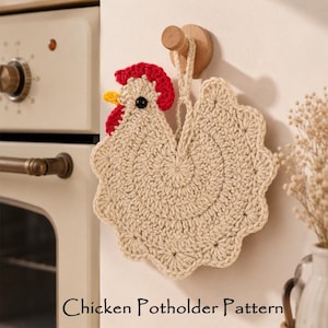 May include: A crocheted chicken potholder in beige, red, and yellow hangs on a wooden peg. The potholder has a circular body with a scalloped edge and a chicken head design. The text "Chicken Potholder Pattern" is at the bottom.