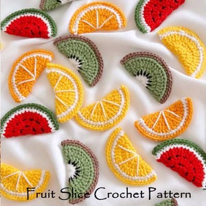 May include: Crocheted fruit slices in various colors, including red watermelon, orange, yellow lemon, and green kiwi. The handmade slices are arranged on a white surface. The text "Fruit Slice Crochet Pattern" is at the bottom.
