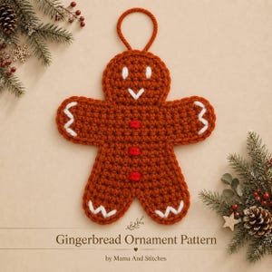 May include: A brown crochet gingerbread man ornament featuring white stitched eyes, a white stitched mouth, three red stitched buttons, and white zigzag details on the hands and feet. A matching brown yarn loop is attached to the top for hanging.