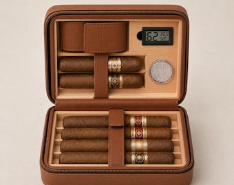 May include: A brown leather cigar travel case with a zipper closure, containing six cigars held by brown leather straps. The interior features a light wood lining, a digital hygrometer displaying 62 percent humidity, and a small circular humidifier.