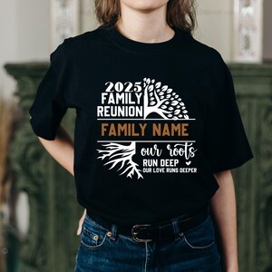 May include: Black t-shirt with a family reunion design. The design includes the text "2025 Family Reunion" above "Family Name" and "our roots run deep, our love runs deeper" with a tree graphic.