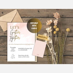 May include: Thanksgiving dinner invitation with the text "Let's Gather Together" in gold script. The invitation is on a white background with a watercolor wash and includes details for the event. A kraft paper envelope and dried flowers complete the scene.