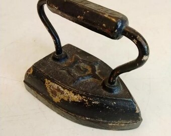 Vintage Geneva ILL. Cast Iron Sad Iron Star Antique Door Stop