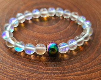 Pulsera de cuarzo sirena iridiscente con hematita: una joya para el brazo