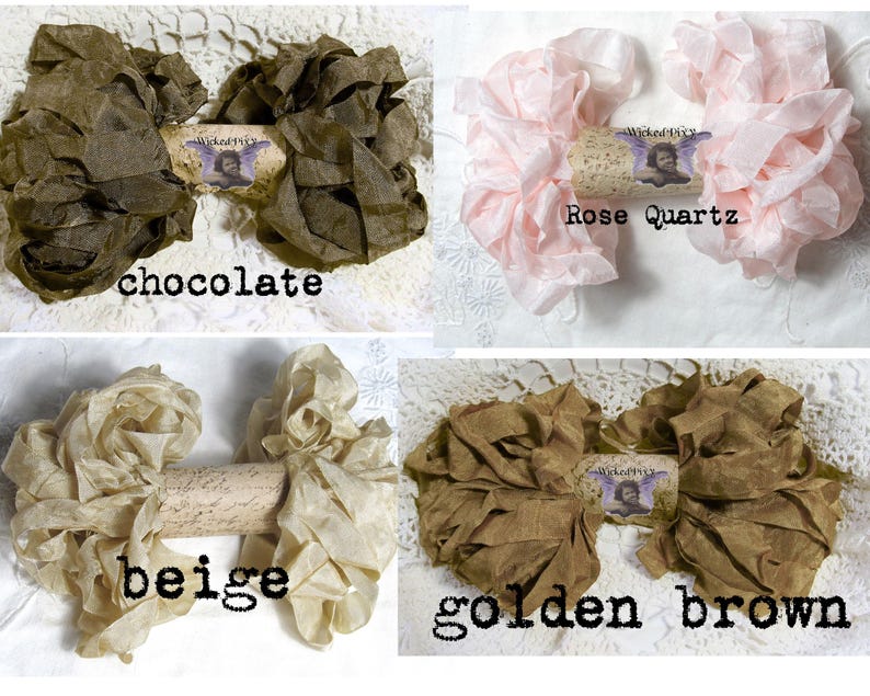 May include: Four fabric flower arrangements in chocolate, rose quartz, beige, and golden brown. Each arrangement is centered on a decorative cork with the text "Wicked Pixie" and a small image. The colors are displayed on a white lace background.