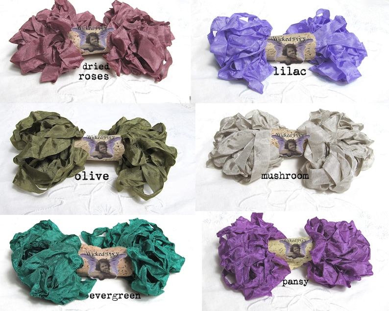 May include: Assortment of ruffled silk ribbons in various colors, including dried roses, lilac, olive, mushroom, evergreen, and pansy. Each ribbon is bundled and labeled with the text "Wicked Pixy". These ribbons are suitable for crafts and embellishments.
