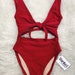 see more listings in the One Pieces section