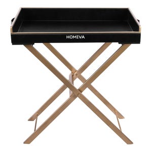 Puede incluir: Una bandeja rectangular negra con costuras blancas y el texto HOMIVA impreso en el frente, sostenida por una base de metal dorado en forma de X. La bandeja cuenta con bordes elevados y asas laterales sobre un soporte plegable de cuatro patas.