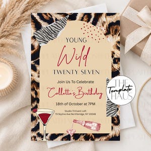 May include: A rectangular birthday invitation card featuring a leopard print border, a central beige arch, and black and red text reading Young Wild Twenty Seven, Join Us To Celebrate Collette's Birthday, 18th of October at 7PM, Studio 73 Event Loft.